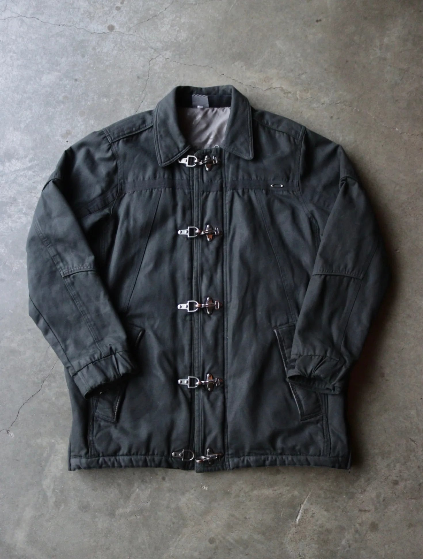 1990S OAKLEY SOFTWARE CLASP JACKET – TWO FOLD 1990S OAKLEY SOFTWARE CLASP JACKET – TWO FOLD