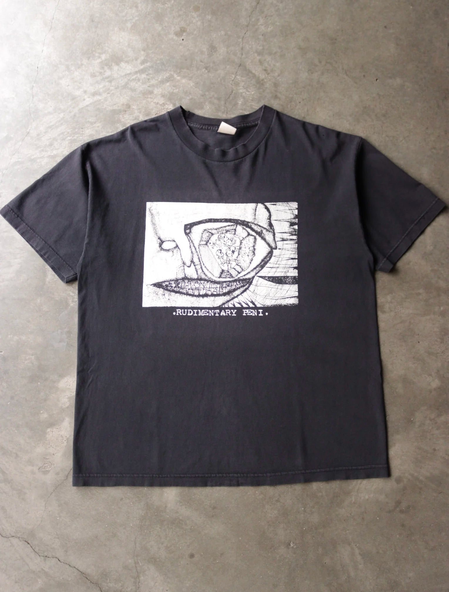 2000S RUDIMENTARY PENI. TEE
