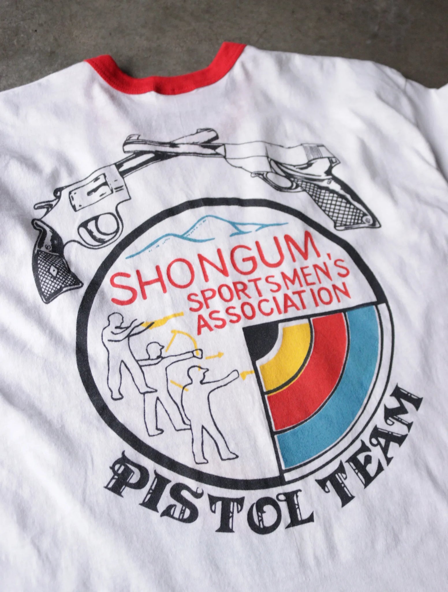 1980S PISTOL TEAM TEE