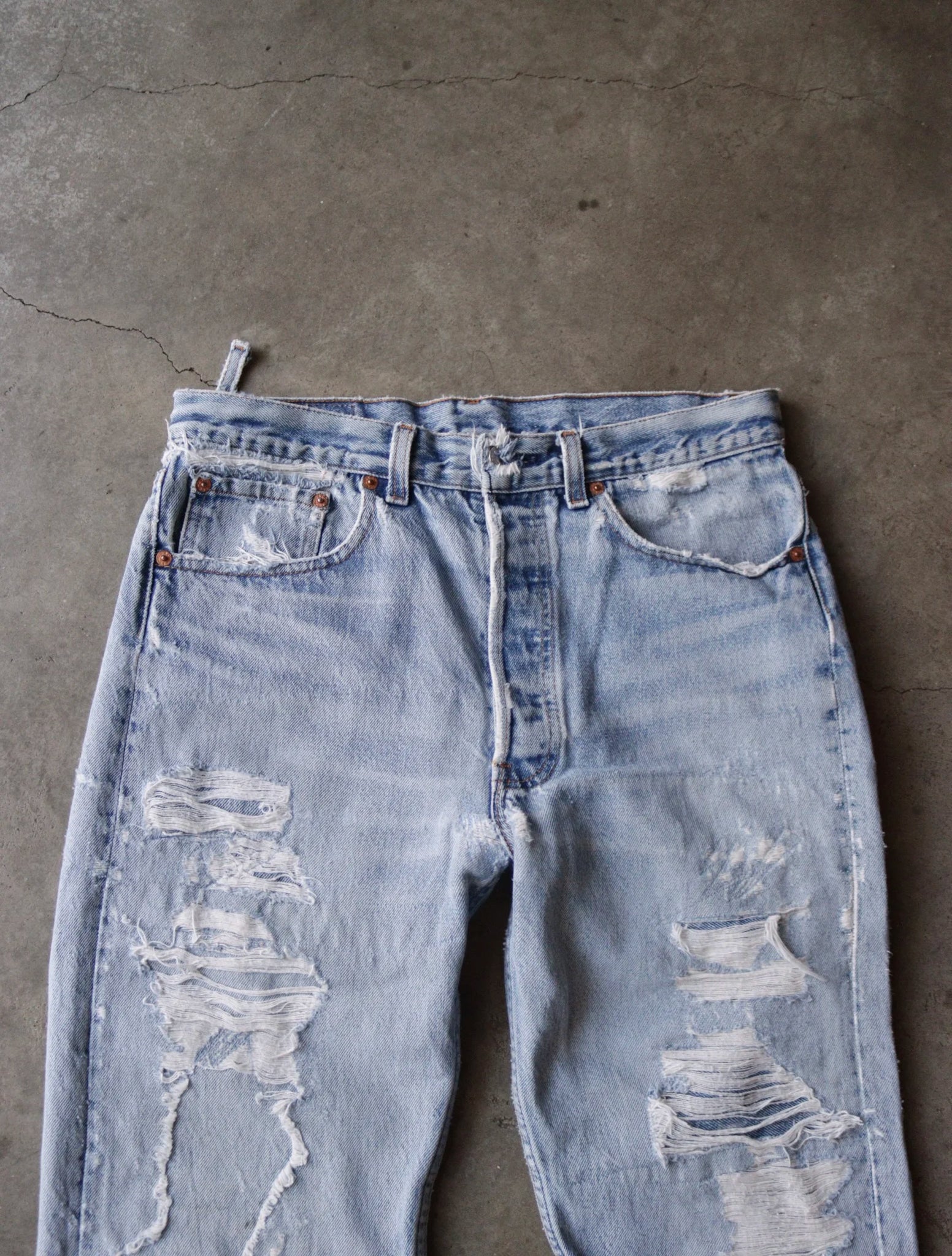 1990S THRASHED LEVI'S DENIM PANTS