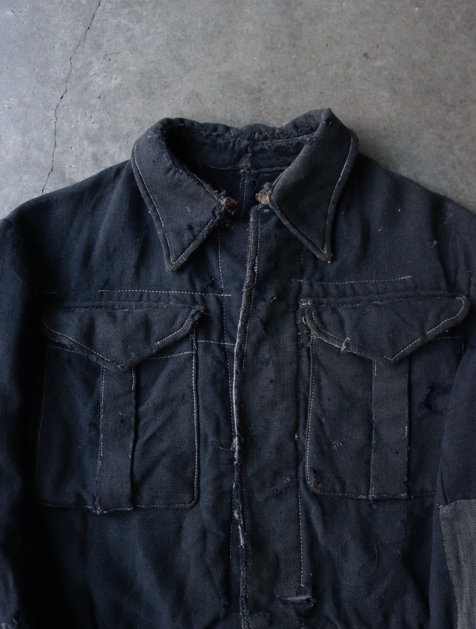 1920S FADED DISTRESSED AND REPAIRED JACKET
