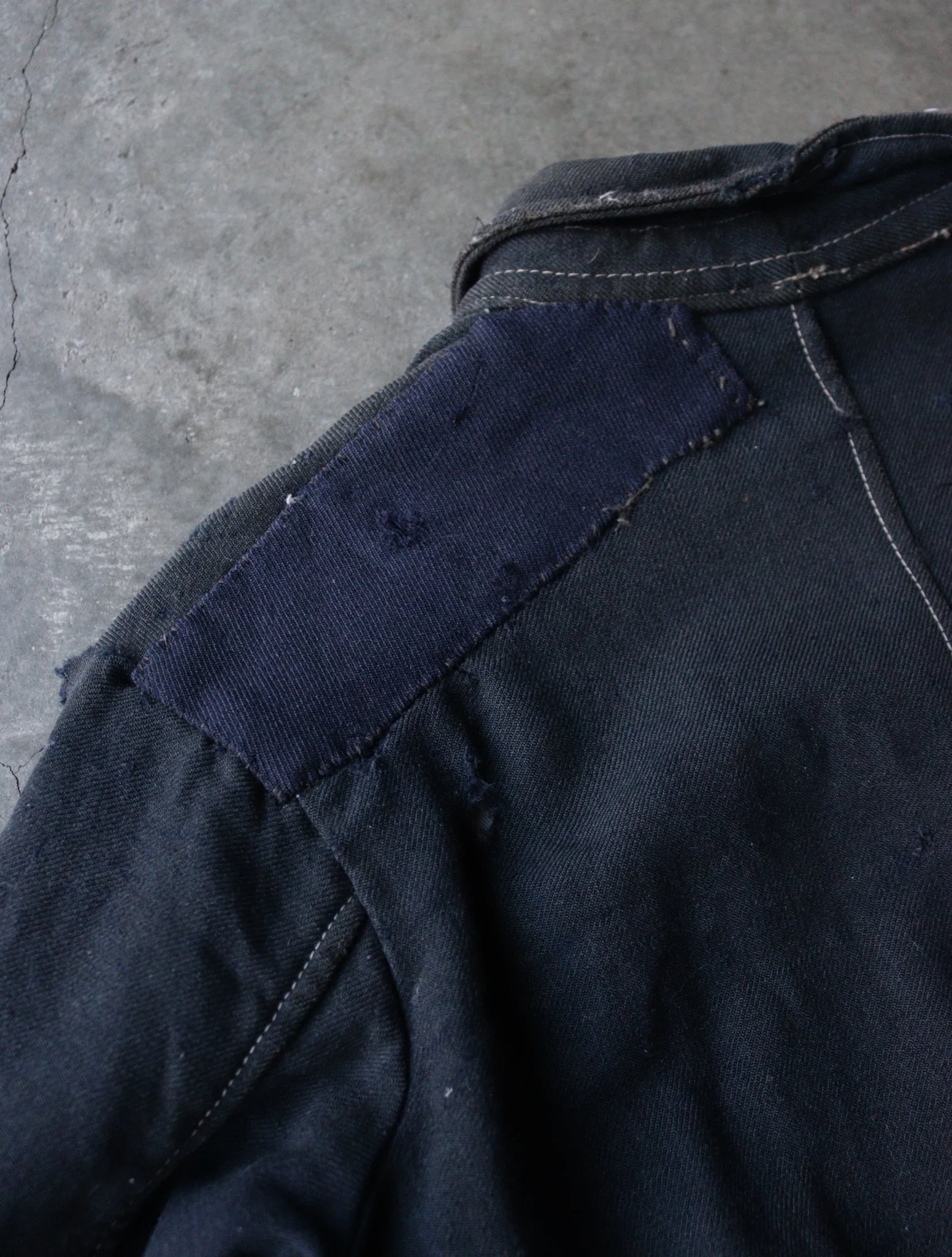 1920S FADED DISTRESSED AND REPAIRED JACKET