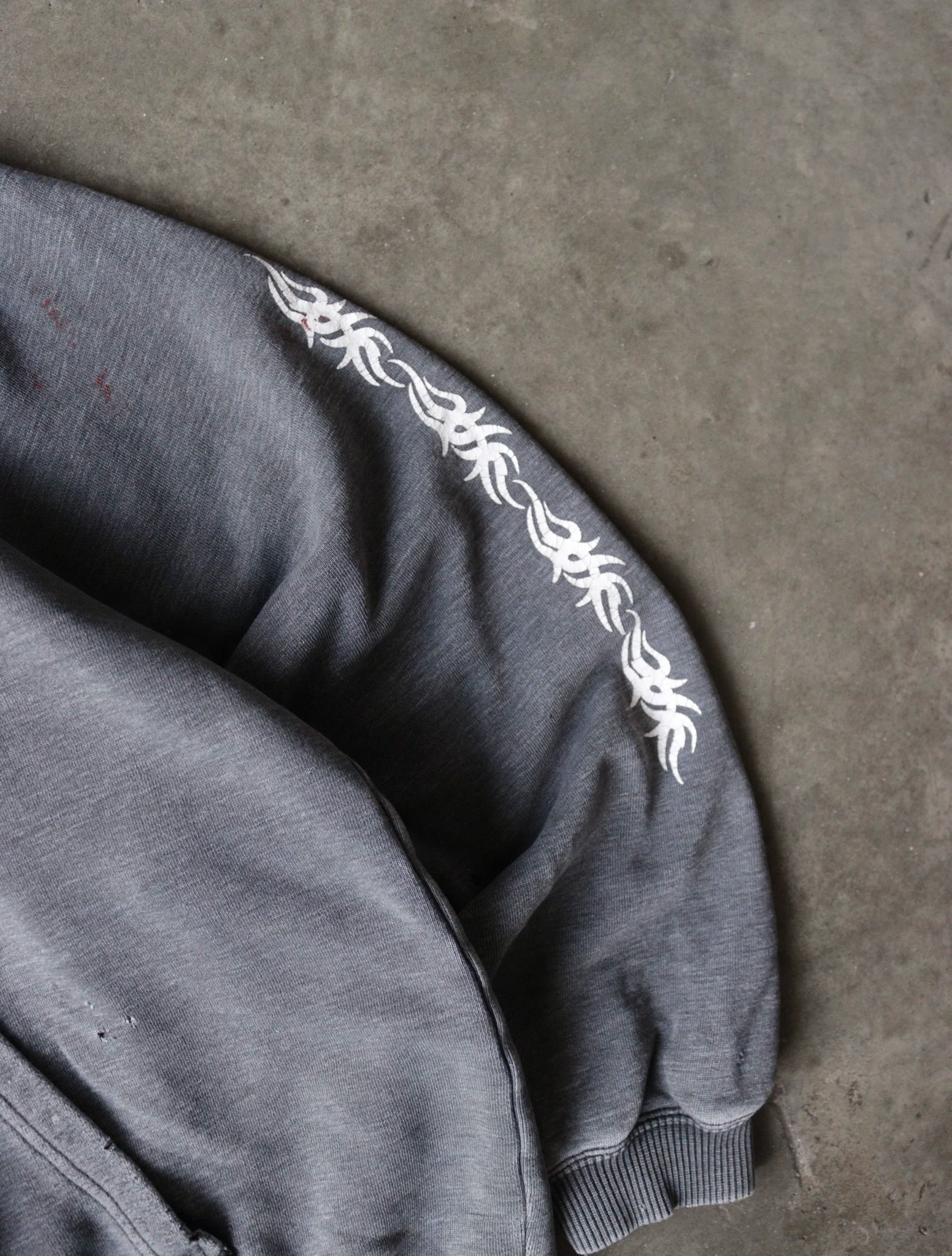 2000S TRIBAL HOODED SWEATSHIRT