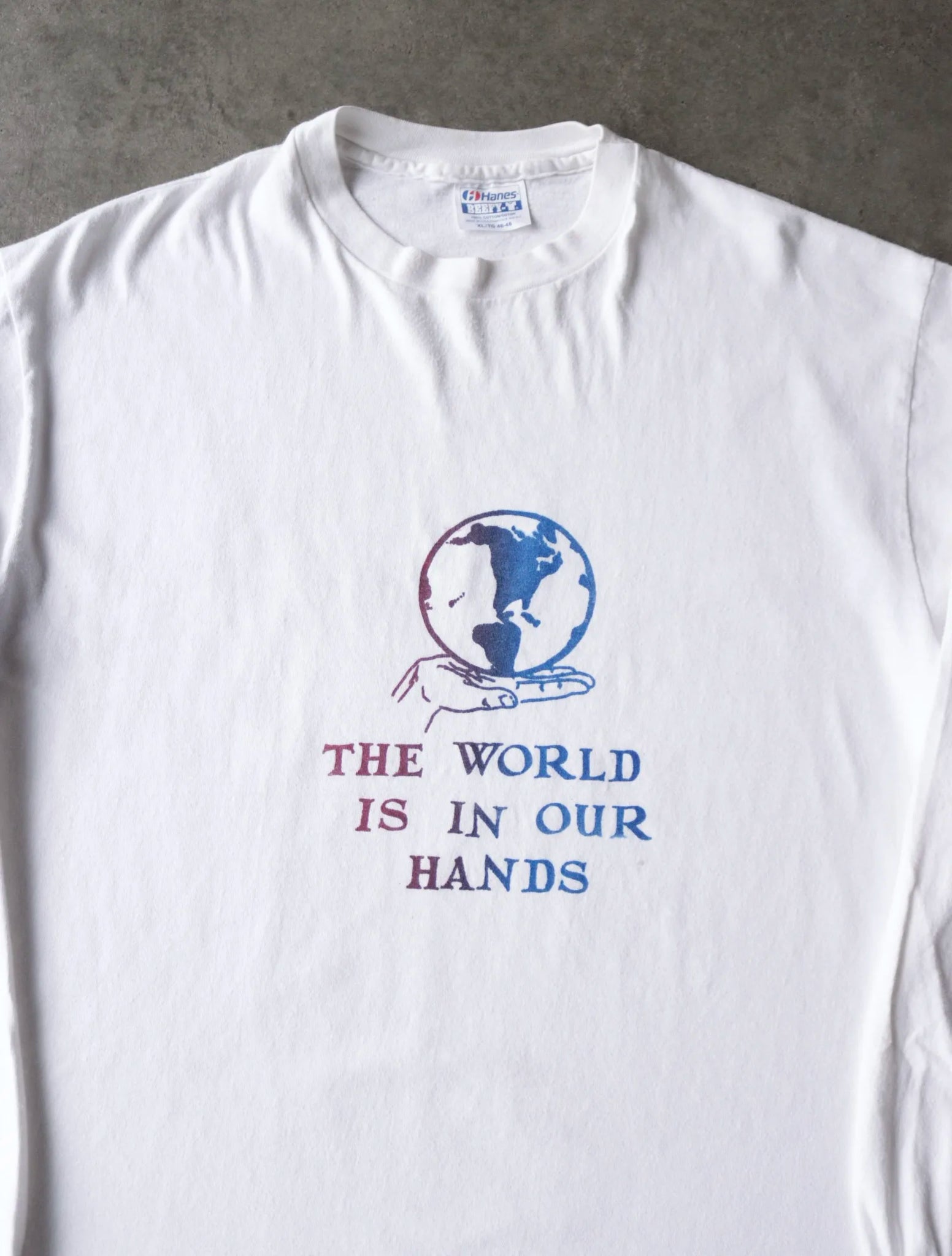 1990S THE WORLD IS IN YOUR HANDS TEE