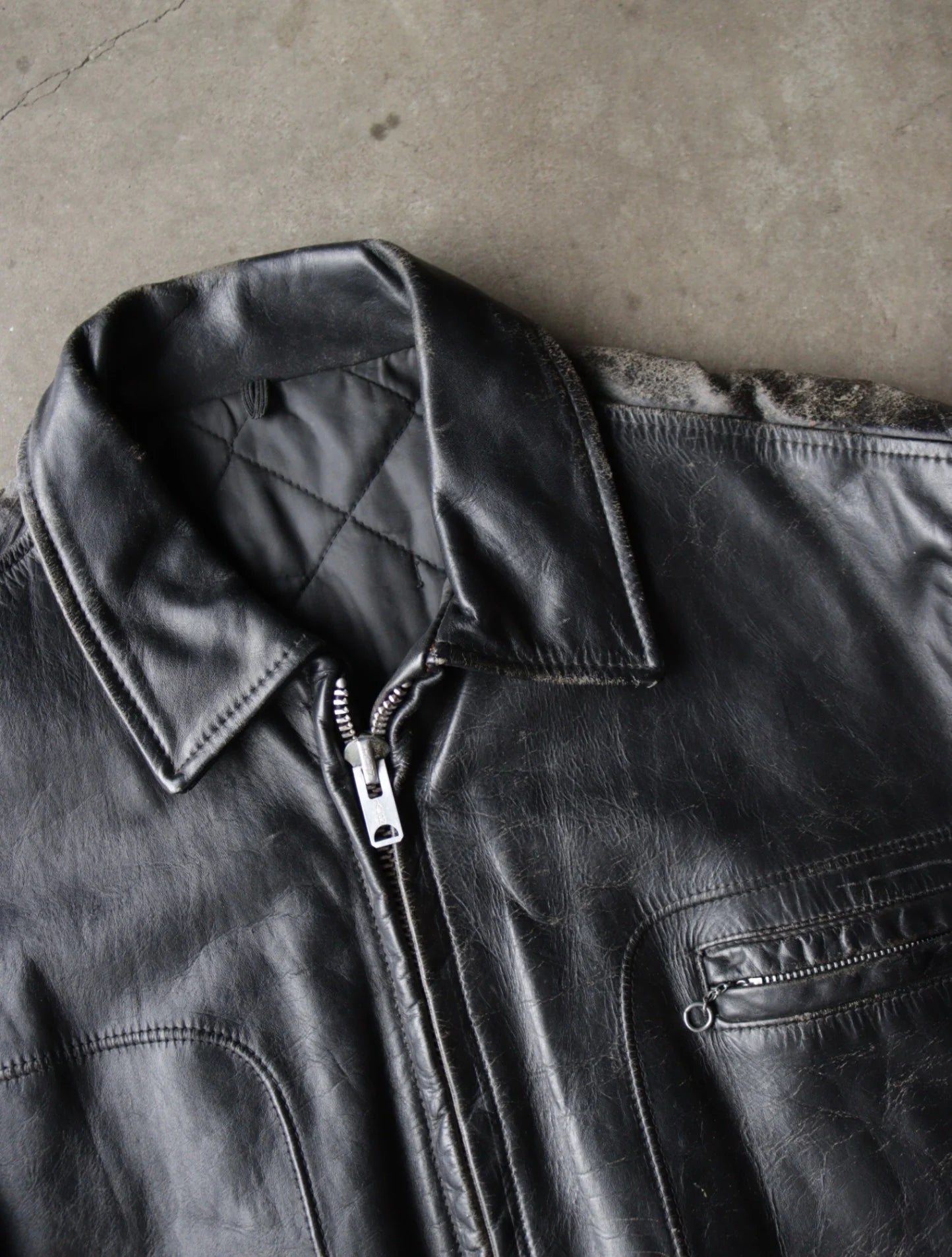 1960S BLACK LEATHER DISTRESSED JACKET