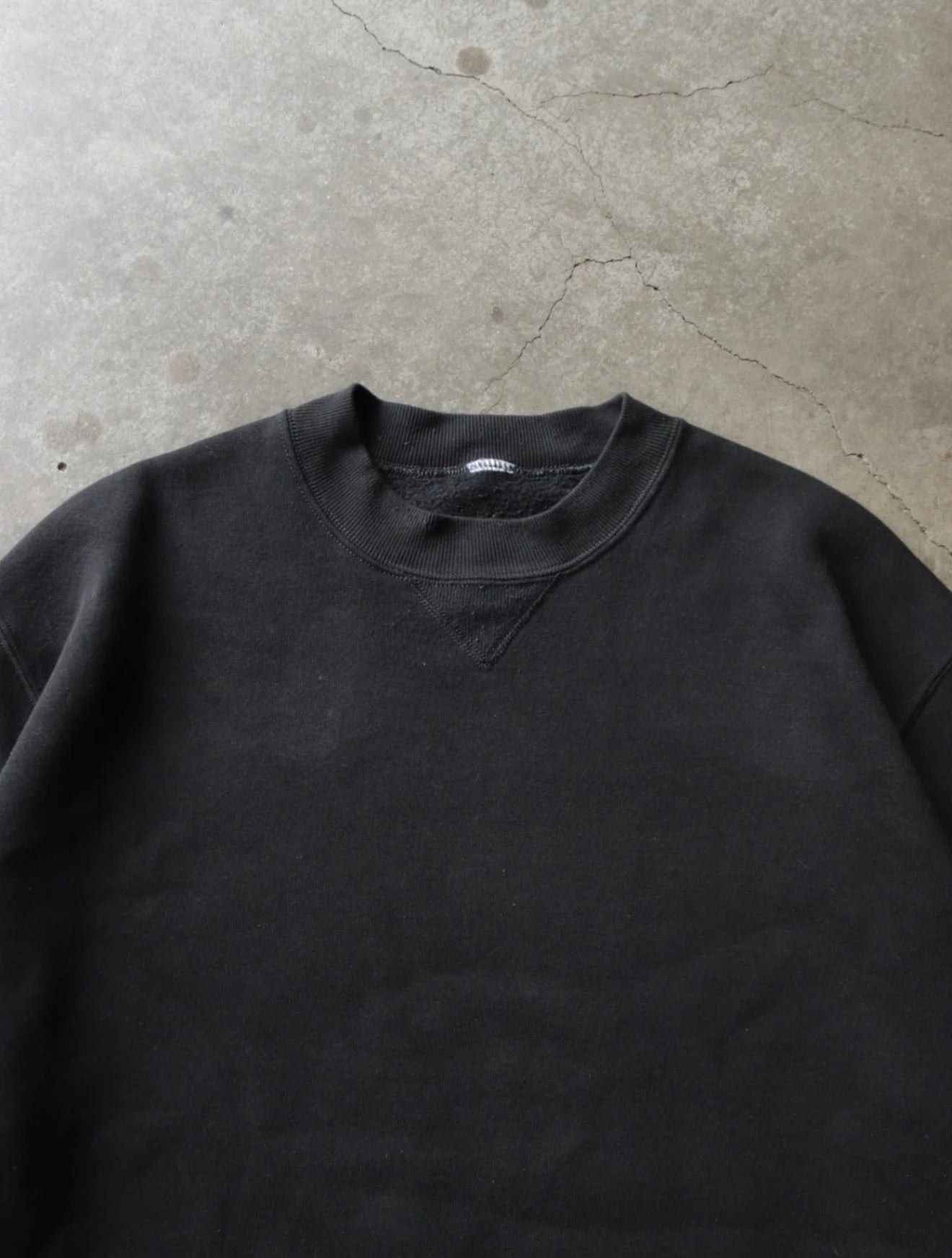 1990S RUSSELL FADED BLACK SWEATSHIRT