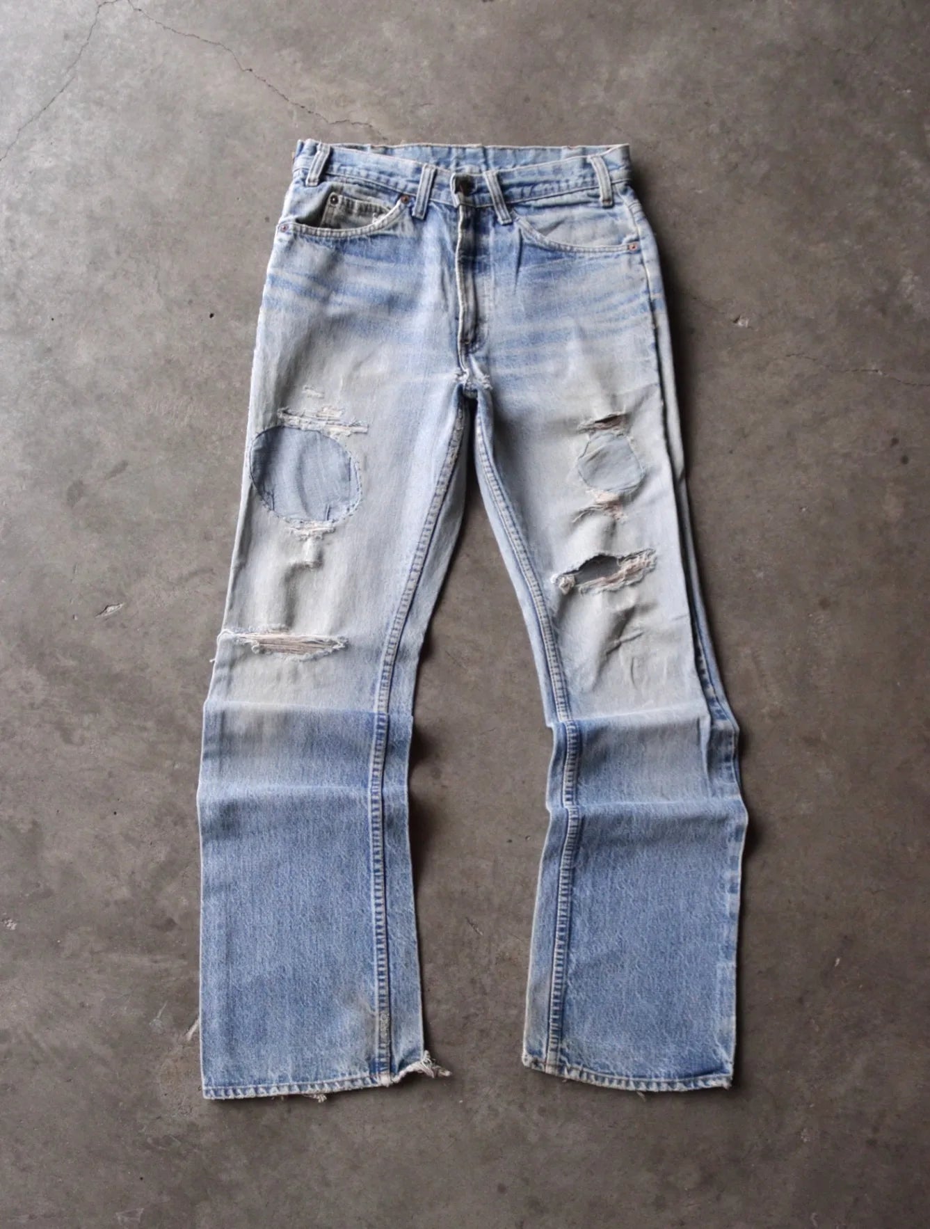 1970S PATCHWORK DISTRESSED LEVI'S 517 DENIM PANTS