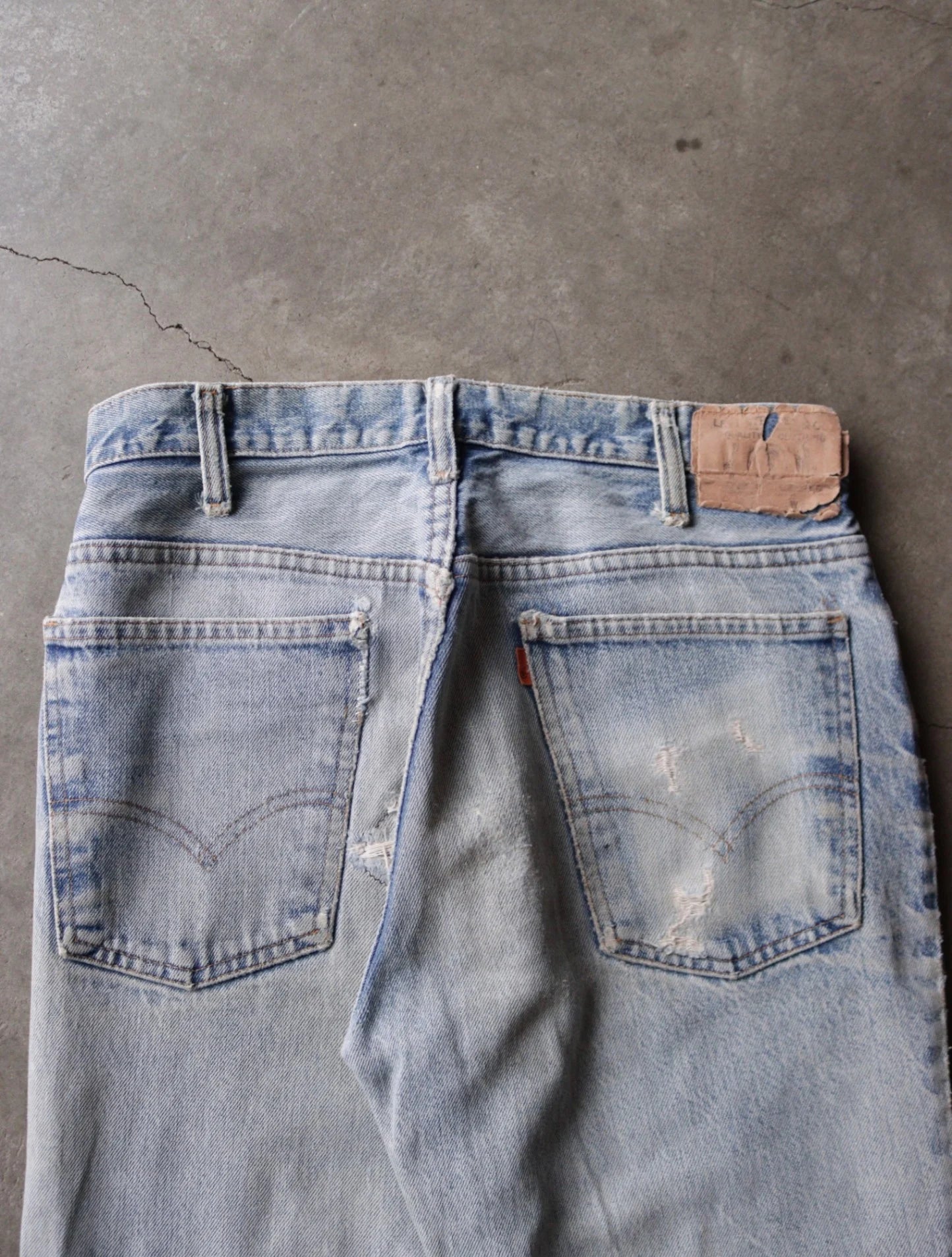 1970S PATCHWORK DISTRESSED LEVI'S 517 DENIM PANTS