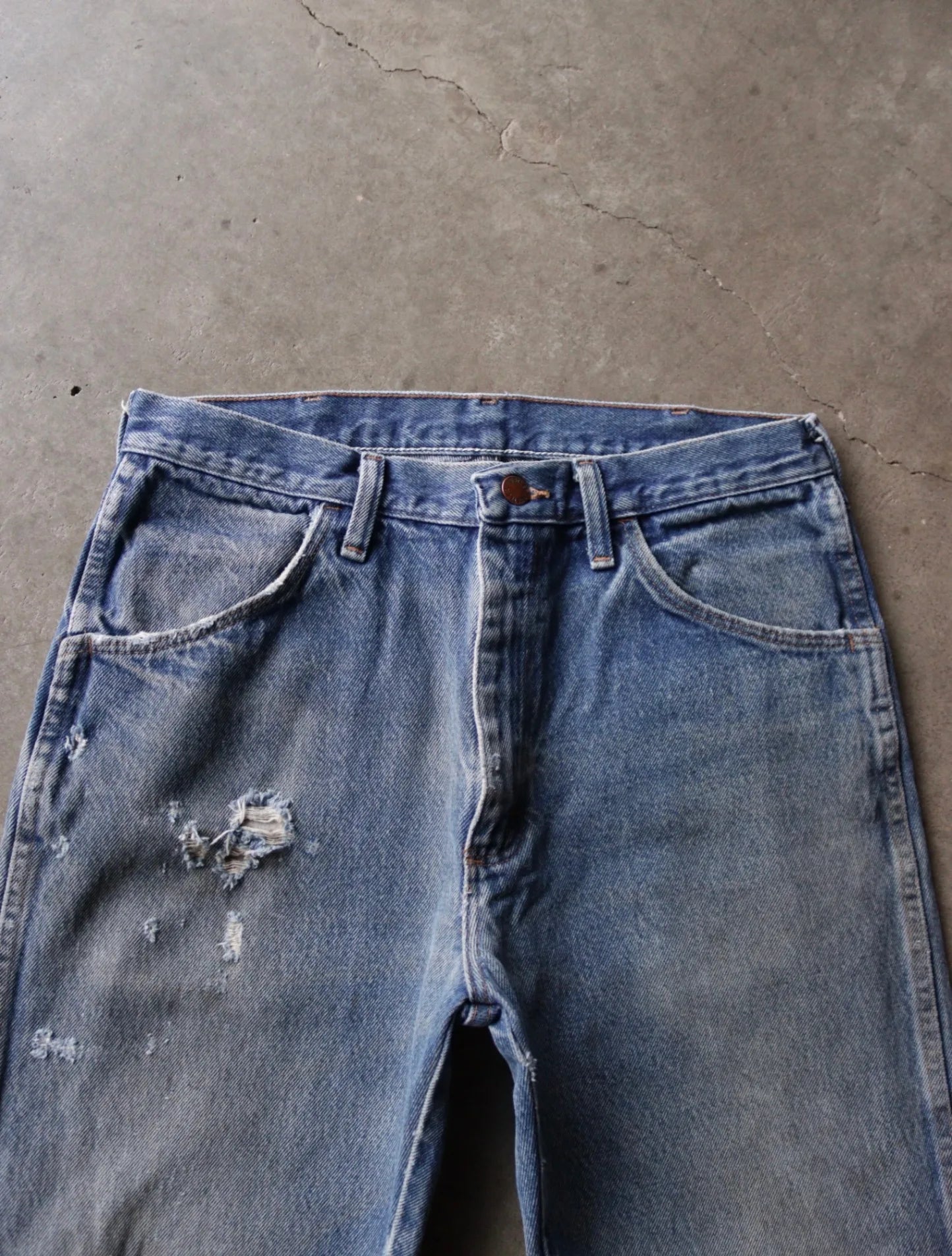 2000S DISTRESSED RUSTLER DENIM PANTS