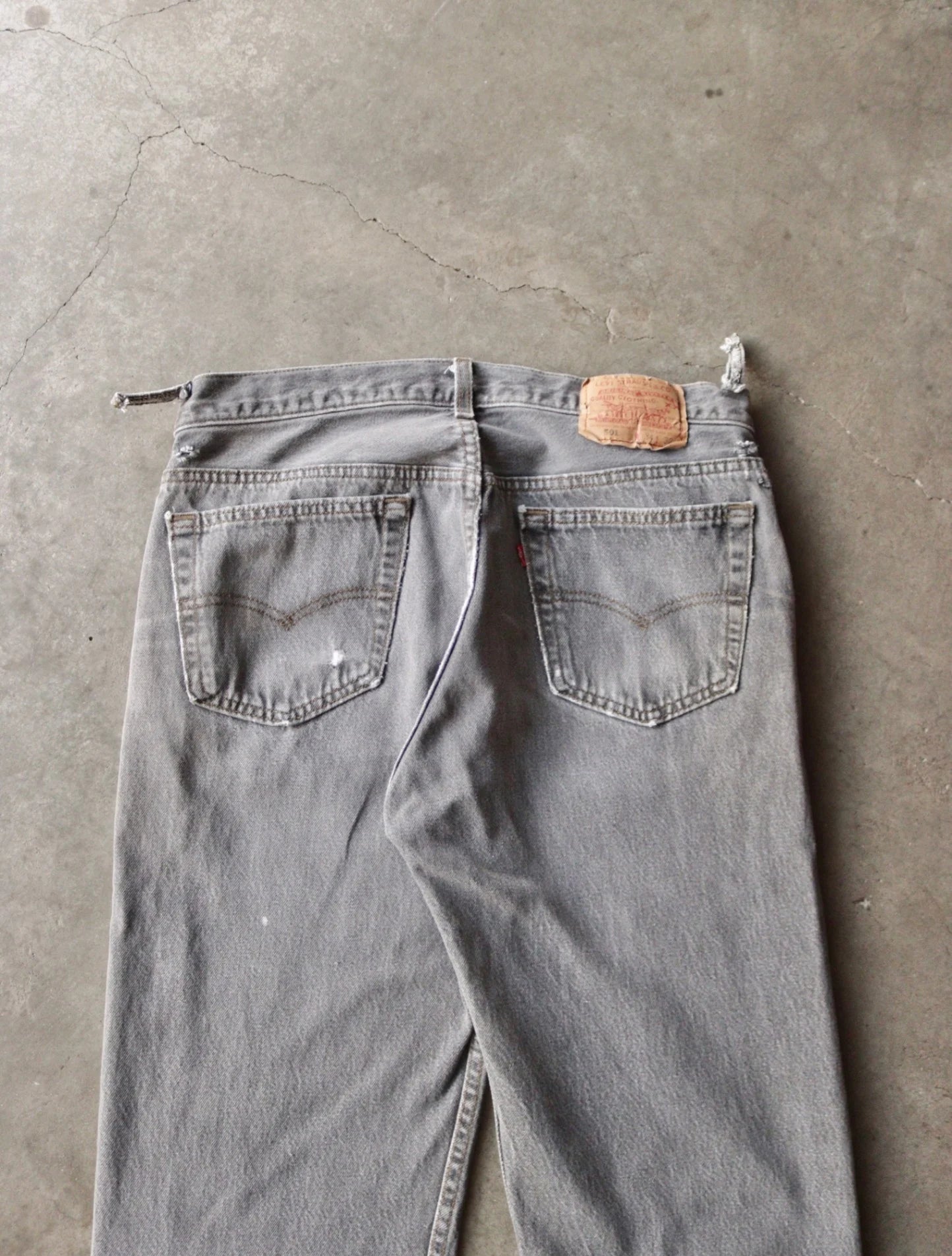 1990S LEVI'S 501 DISTRESSED DENIM PANTS