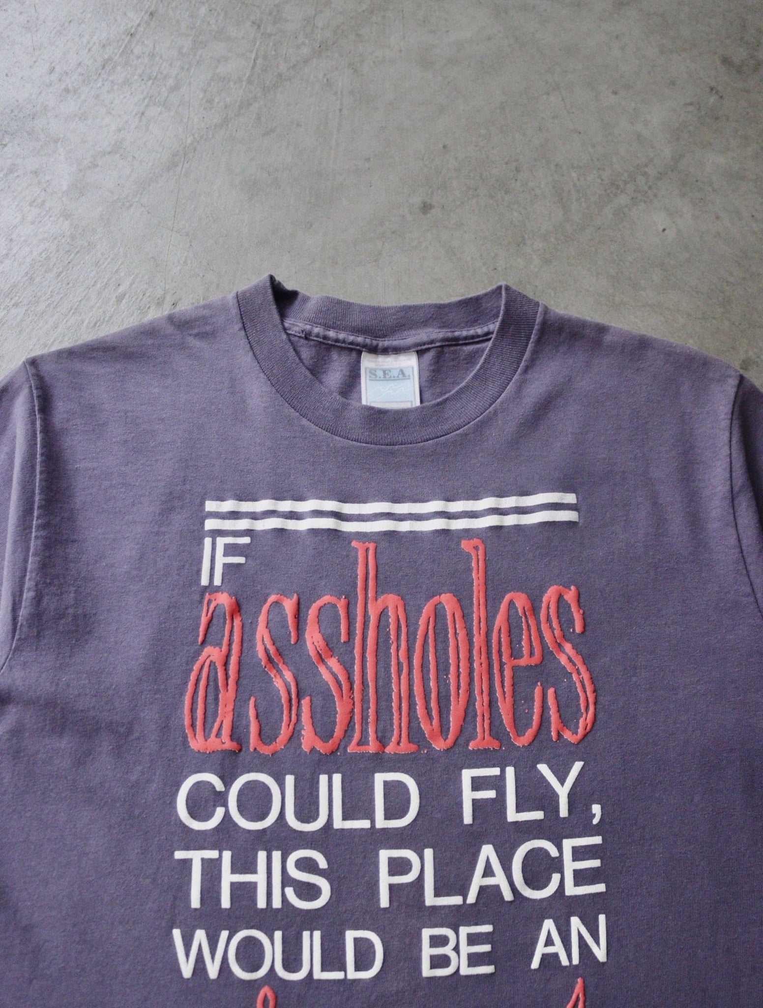 1990S ASSHOLE AIRPORT TEE