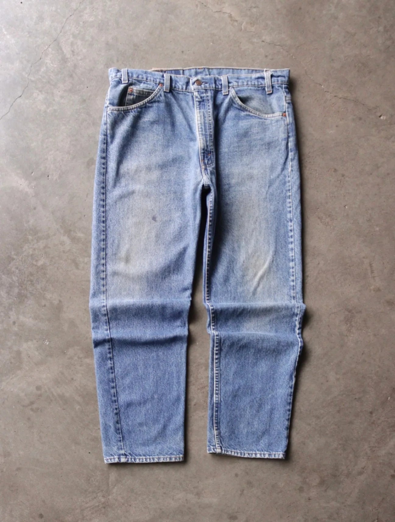 1980S FADED ORANGE TAB LEVI'S 505 DENIM PANTS