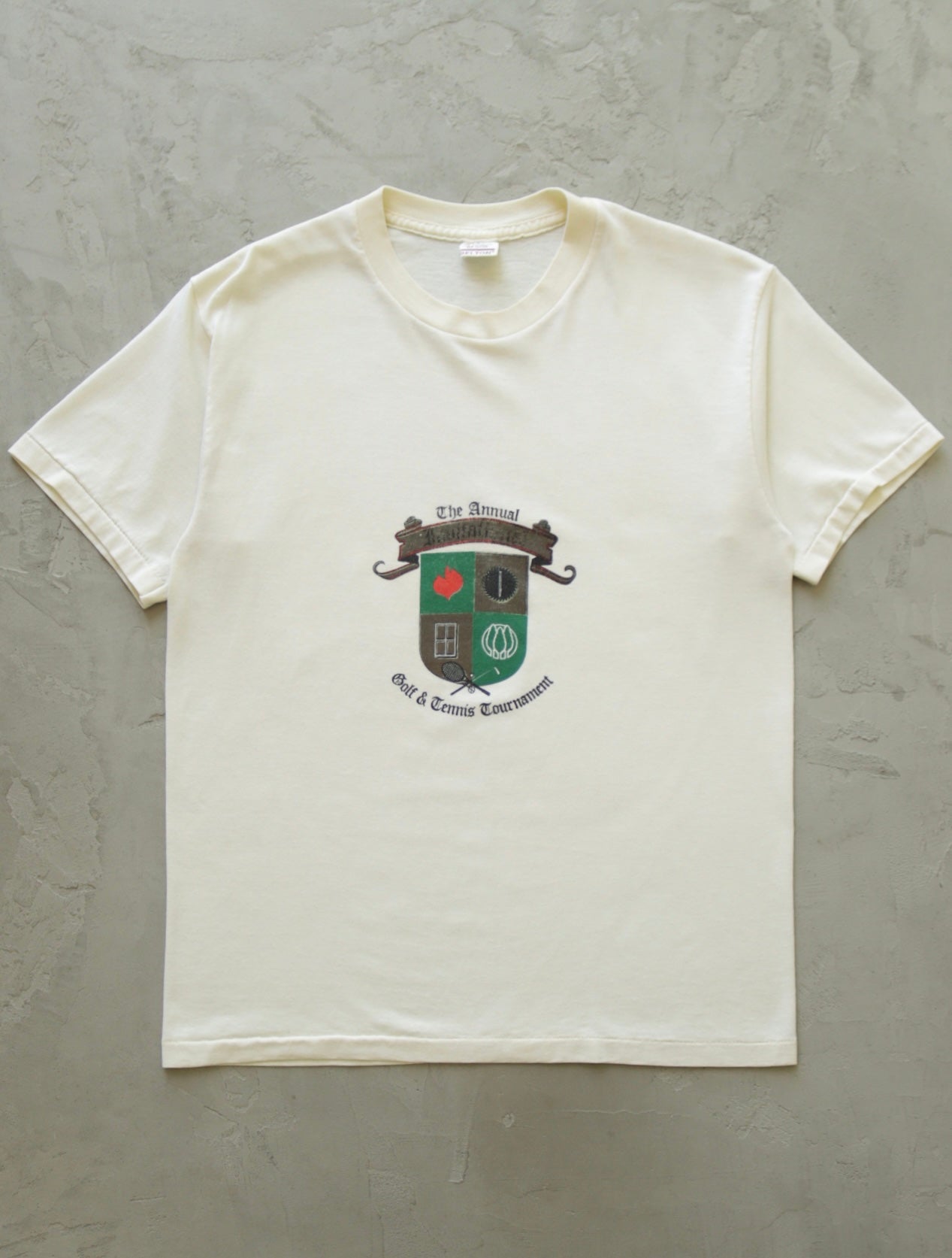 1980S GOLD AND TENNIS TOURNAMENT TEE - TWO FOLD