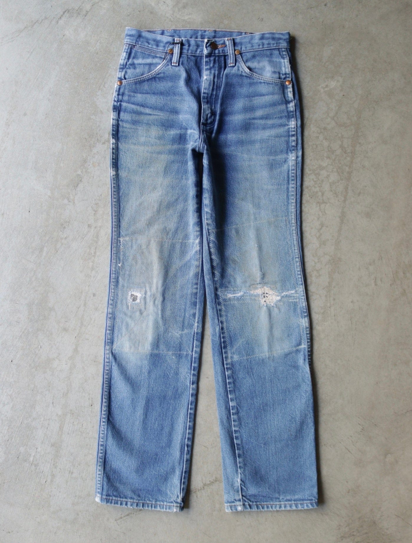 1990S REPAIRED DISTRESSED WRAGLER DENIM PANTS - TWO FOLD