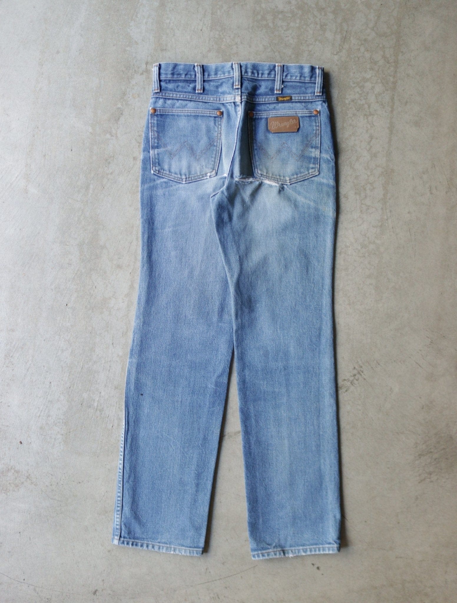 1990S REPAIRED DISTRESSED WRAGLER DENIM PANTS - TWO FOLD